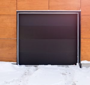 why won't my garage door close in cold weather